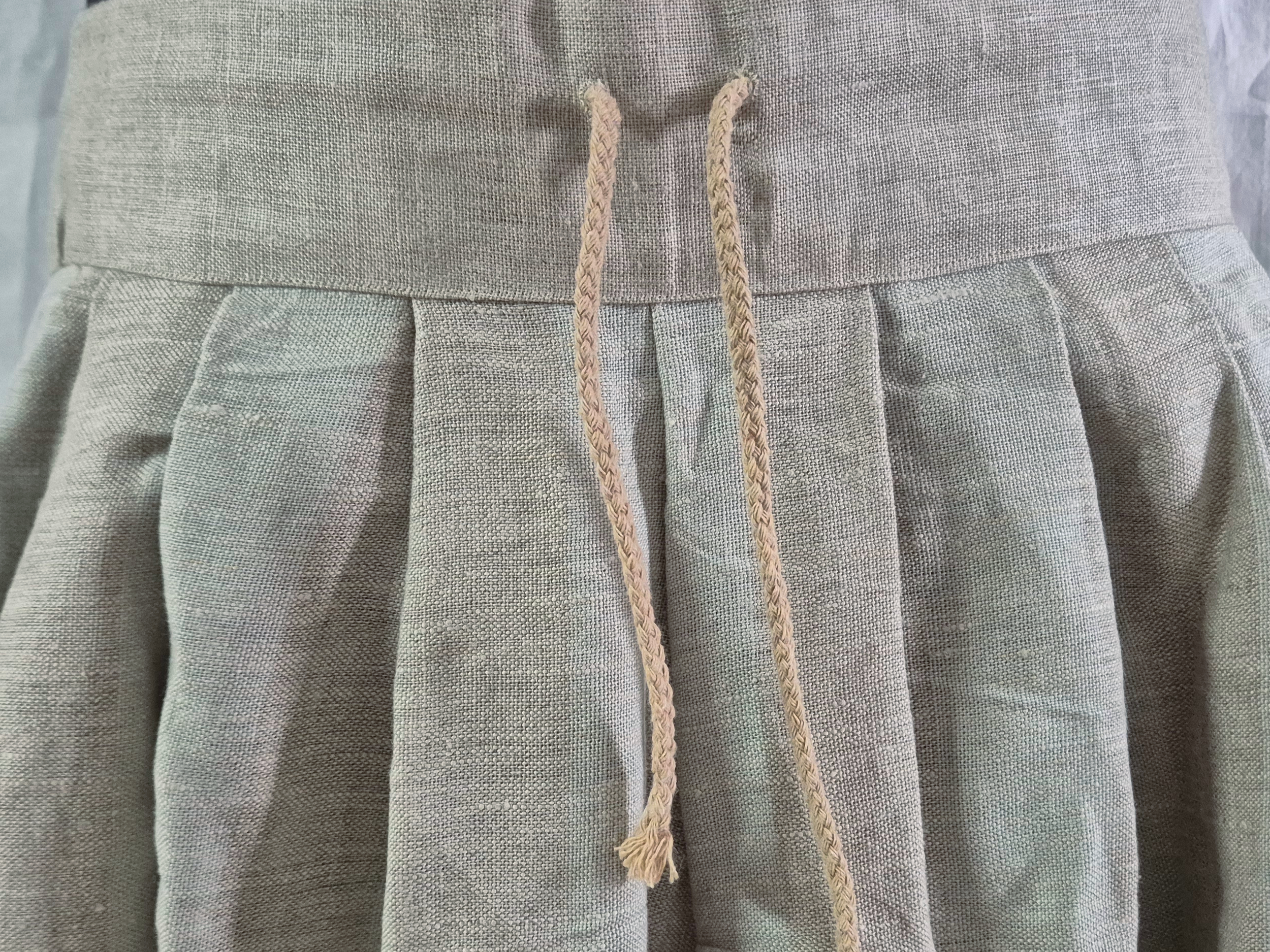 Nabírané lněné kalhoty světle zelené -přírodní proužek, vel. 30