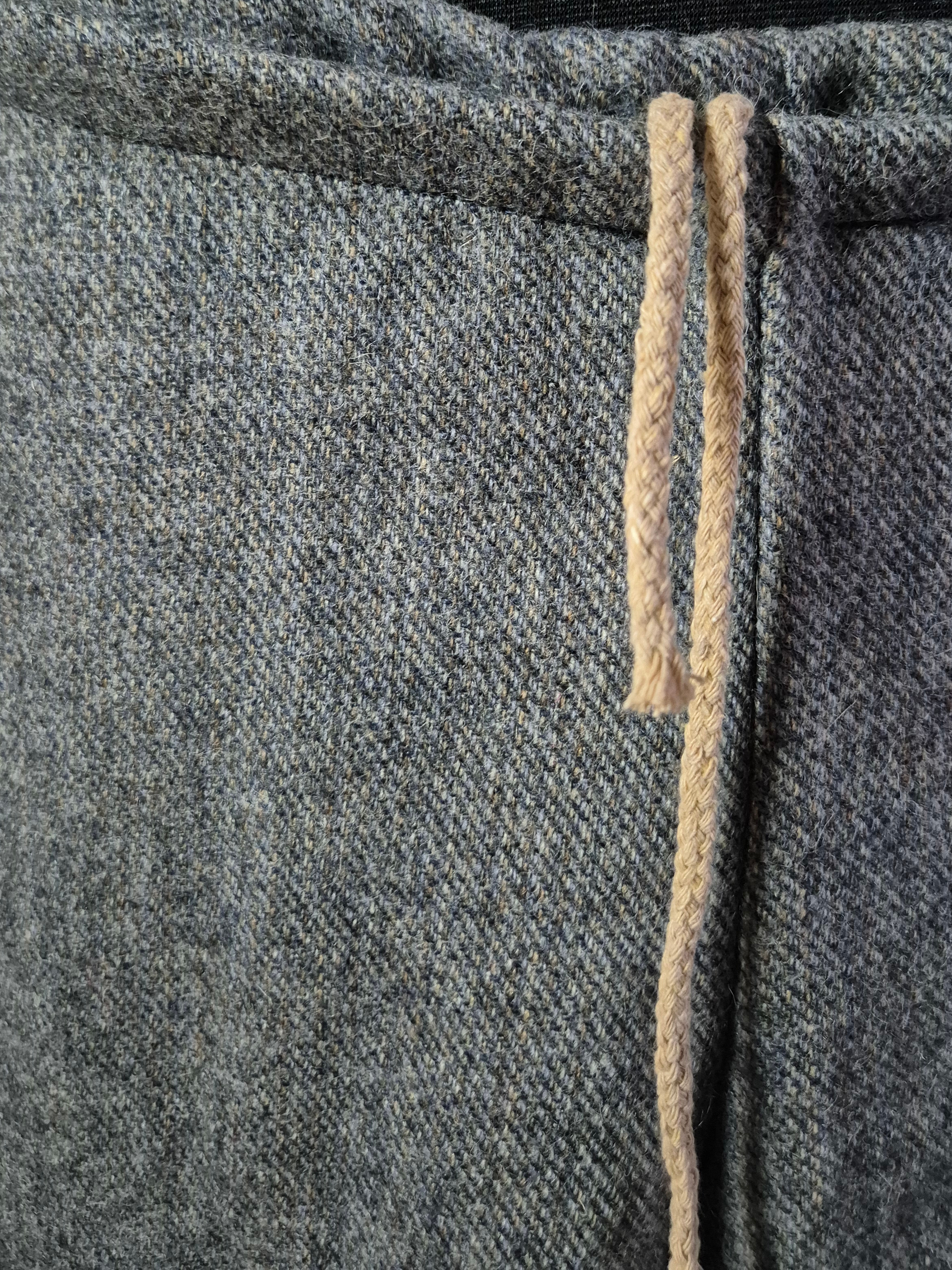 Kalhoty vlněné šedé vel.32